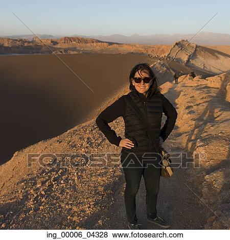 Woman in desert, Valle de la Luna, San Pedro de Atacama, El Loa Province, Antofagasta Region, Chile View Large Photo Image Stock Photo - Woman in desert, Valle de la Luna, San Pedro de Atacama, El Loa Province, Antofagasta Region, Chile. Fotosearch
