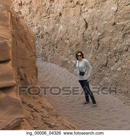 Woman in desert, Valle de la Luna, San Pedro de Atacama, El Loa Province, Antofagasta Region, Chile View Large Photo Image Stock Photograph - Woman in desert, Valle de la Luna, San Pedro de Atacama, El Loa Province, Antofagasta Region, Chile. Fotosearch