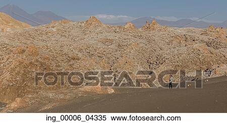 Woman in desert, Valle de la Luna, San Pedro de Atacama, El Loa Province, Antofagasta Region, Chile View Large Photo Image Stock Photography - Woman in desert, Valle de la Luna, San Pedro de Atacama, El Loa Province, Antofagasta Region, Chile. Fotosearch