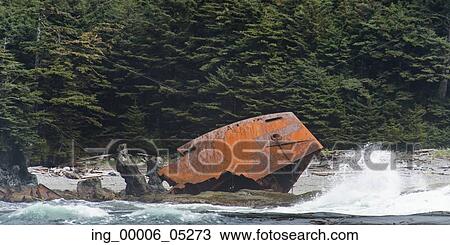 Stock Image - Wreckage washed up on shoreline, Skeena-Queen Charlotte Regional District, Haida Gwaii, Graham Island, British Columbia, Canada. Fotosearch
