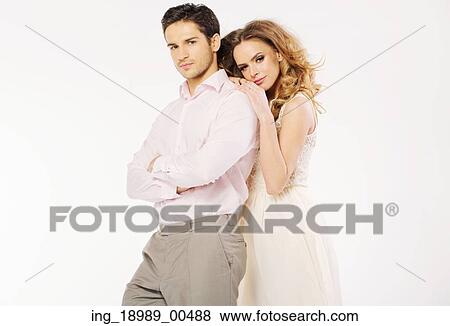 Stock Photo - Young attractive couple in the love gesture. Fotosearch