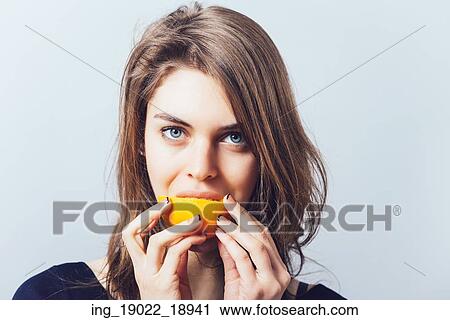 young beautiful woman with citrus orange fruit having fun. View Large Photo Image Stock Image - young beautiful woman with citrus orange fruit having fun. . Fotosearch