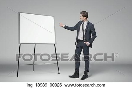 Stock Photograph - Young man making a lecture about business. Fotosearch