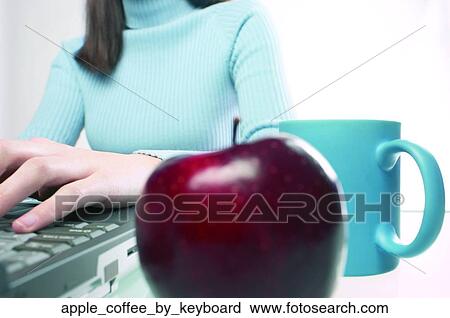 Apple coffee by keyboard View Large Photo Image Stock Image - Apple coffee by keyboard. Fotosearch