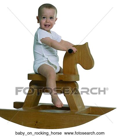 baby on rocking horse