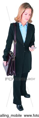 Stock Image - Business dialling mobile. Fotosearch