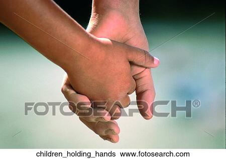 Stock Photograph - Children holding hands. Fotosearch