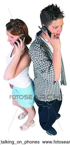 Stock Photograph - Couple talking on phones. Fotosearch