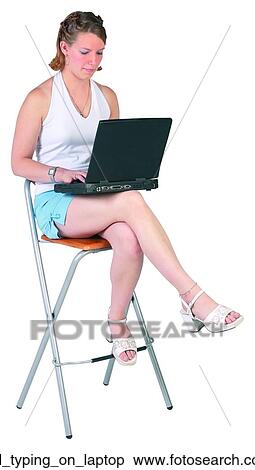 Stock Photography - Girl typing on laptop. Fotosearch