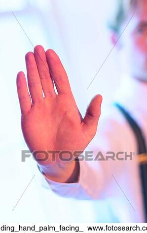 Holding hand palm facing View Large Photo Image Stock Photo - Holding hand palm facing . Fotosearch