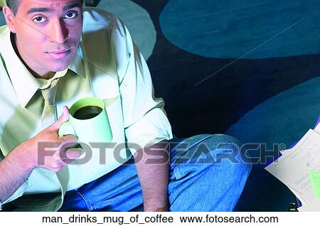 Man drinks mug of coffee View Large Photo Image Stock Image - Man drinks mug of coffee. Fotosearch