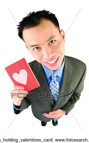 Man holding valentines card View Large Photo Image Stock Image - Man holding valentines card. Fotosearch