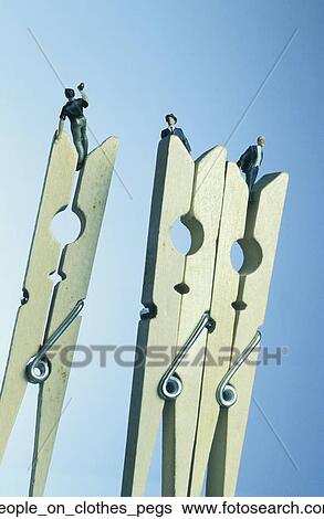 People on clothes pegs View Large Photo Image Stock Photograph - People on clothes pegs. Fotosearch