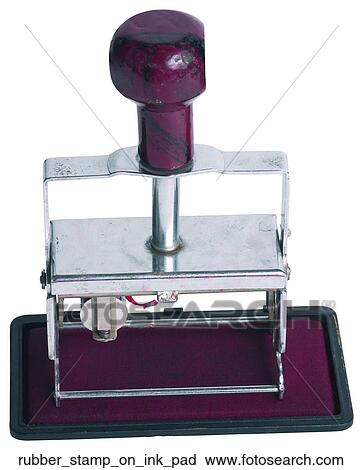 Stock Image - Rubber stamp on ink pad. Fotosearch