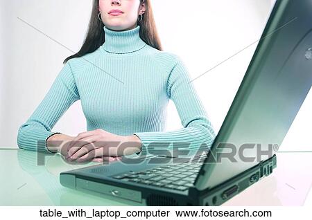Table with laptop computer View Large Photo Image Stock Photography - Table with laptop computer. Fotosearch