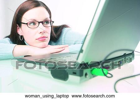Woman using laptop View Large Photo Image Stock Photography - Woman using laptop. Fotosearch