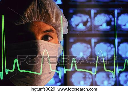 Doctor with MRIs and Heart Line View Large Photo Image Stock Photo - Doctor with MRIs and Heart Line. Fotosearch