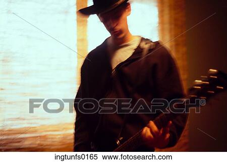 Stock Photography - Playing the Guitar. Fotosearch