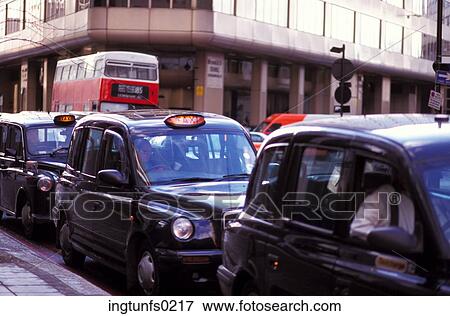 Row of Taxis View Large Photo Image Stock Photo - Row of Taxis. Fotosearch
