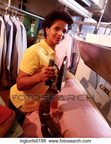 Stock Photo - Woman Dry Cleaning. Fotosearch