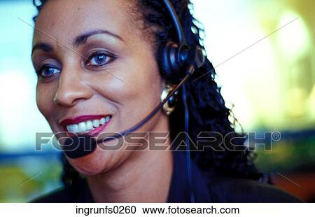 Woman Talking on Headset View Large Photo Image Stock Image - Woman Talking on Headset. Fotosearch