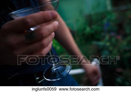 Stock Photo - Back Yard Drinking. Fotosearch