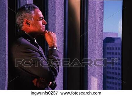Businessman Staring out the Window View Large Photo Image Stock Photo - Businessman Staring out the Window. Fotosearch
