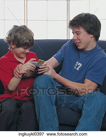Stock Photo - century, kids, 21st. Fotosearch
