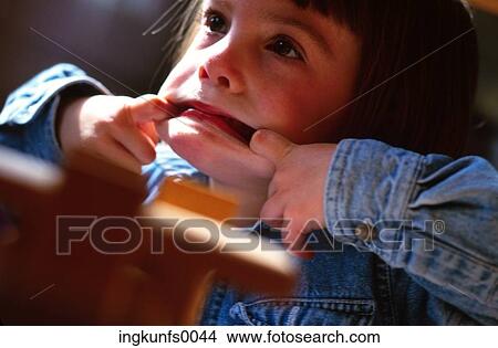 Picture - Child Making Scary Face. Fotosearch