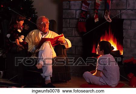 Grandfather Reading to Grandchildren View Large Photo Image Stock Photo - Grandfather Reading to Grandchildren. Fotosearch