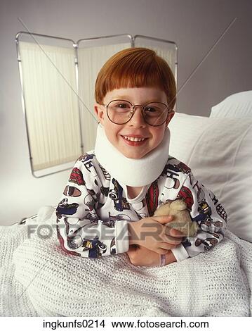 Picture - Little Boy in Hospital Bed. Fotosearch