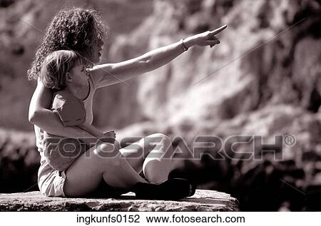 Stock Image - Woman With Baby. Fotosearch