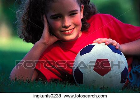 Stock Photo - Young Girl with Soccer Ball. Fotosearch