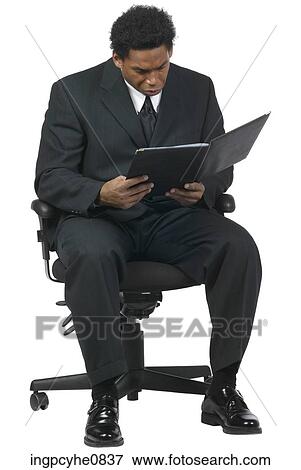 Business man with a book View Large Photo Image Stock Photo - Business man with a book . Fotosearch