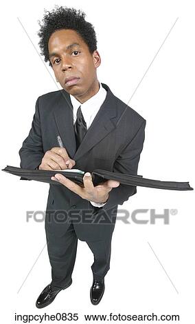 Business man with a book View Large Photo Image Stock Photography - Business man with a book. Fotosearch