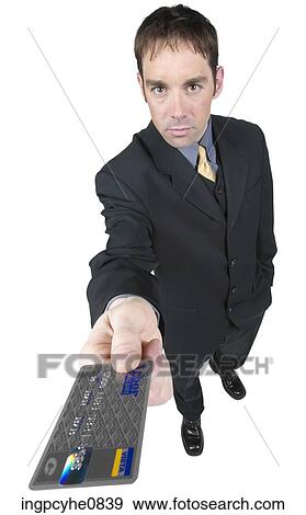Stock Photo - Business man with a credit card. Fotosearch