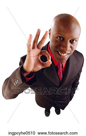 Businessman giving okay sign View Large Photo Image Stock Image - Businessman giving okay sign . Fotosearch