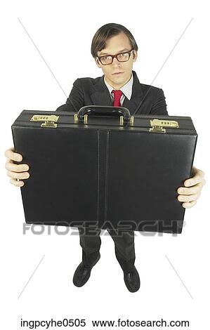 Businessman holding out briefcase L View Large Photo Image Stock Photography - Businessman holding out briefcase L . Fotosearch