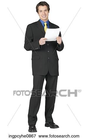 Businessman reading paper View Large Photo Image Stock Photo - Businessman reading paper. Fotosearch