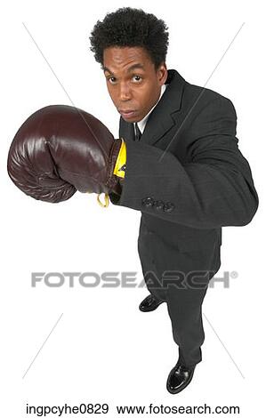 Businessman with boxing gloves View Large Photo Image Stock Photo - Businessman with boxing gloves . Fotosearch