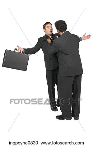 Stock Image - Businessmen having disagreement . Fotosearch