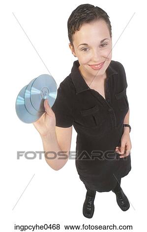 Businesswoman holding CDs L2 View Large Photo Image Stock Photo - Businesswoman holding CDs L2. Fotosearch