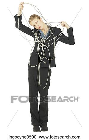 Businesswoman holding electrical cord View Large Photo Image Stock Image - Businesswoman holding electrical cord . Fotosearch