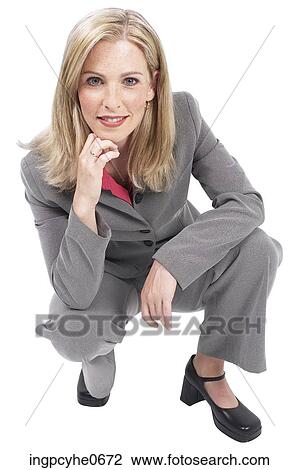 Businesswoman squatting View Large Photo Image Stock Image - Businesswoman squatting . Fotosearch
