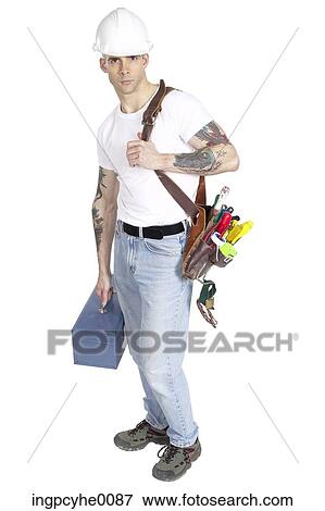 Construction worker carrying tools View Large Photo Image Stock Photo - Construction worker carrying tools . Fotosearch