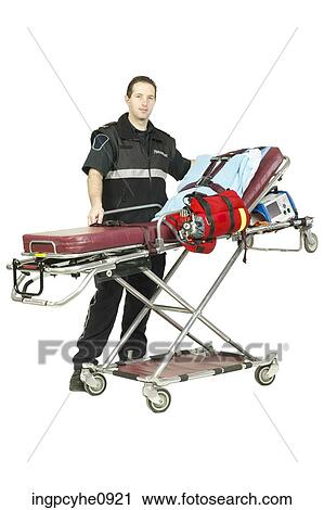 EMS worker with hospital gurney View Large Photo Image Stock Image - EMS worker with hospital gurney. Fotosearch