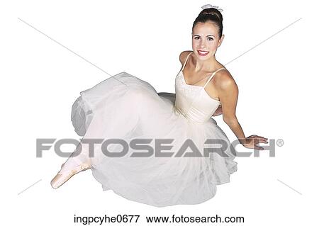 Female ballerina posing in white dress View Large Photo Image Stock Photo - Female ballerina posing in white dress . Fotosearch