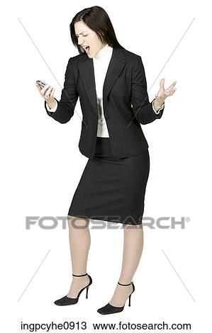 Frustrated businesswoman yelling at cell phone View Large Photo Image Stock Image - Frustrated businesswoman yelling at cell phone. Fotosearch