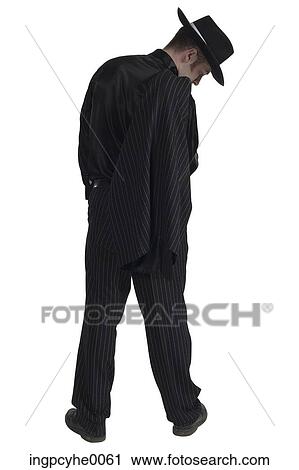 Stock Image - Gangster looking downwards . Fotosearch