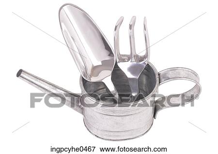 Stock Photo - Gardening tools in metal watering can L3. Fotosearch